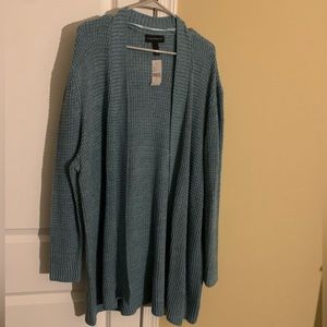 Blue knitted open front cardigan. New w/tags.